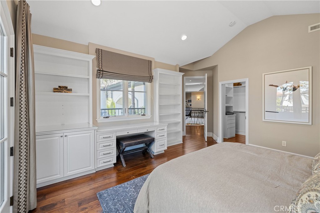 1240 5th Street Manhattan Beach, CA 90266 - Photo 49 of 68 a bedroom with a bed and a table with closet