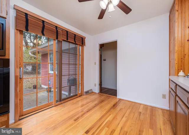 a view of empty room with front door