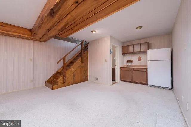 a view of a storage & utility room with washer and dryer
