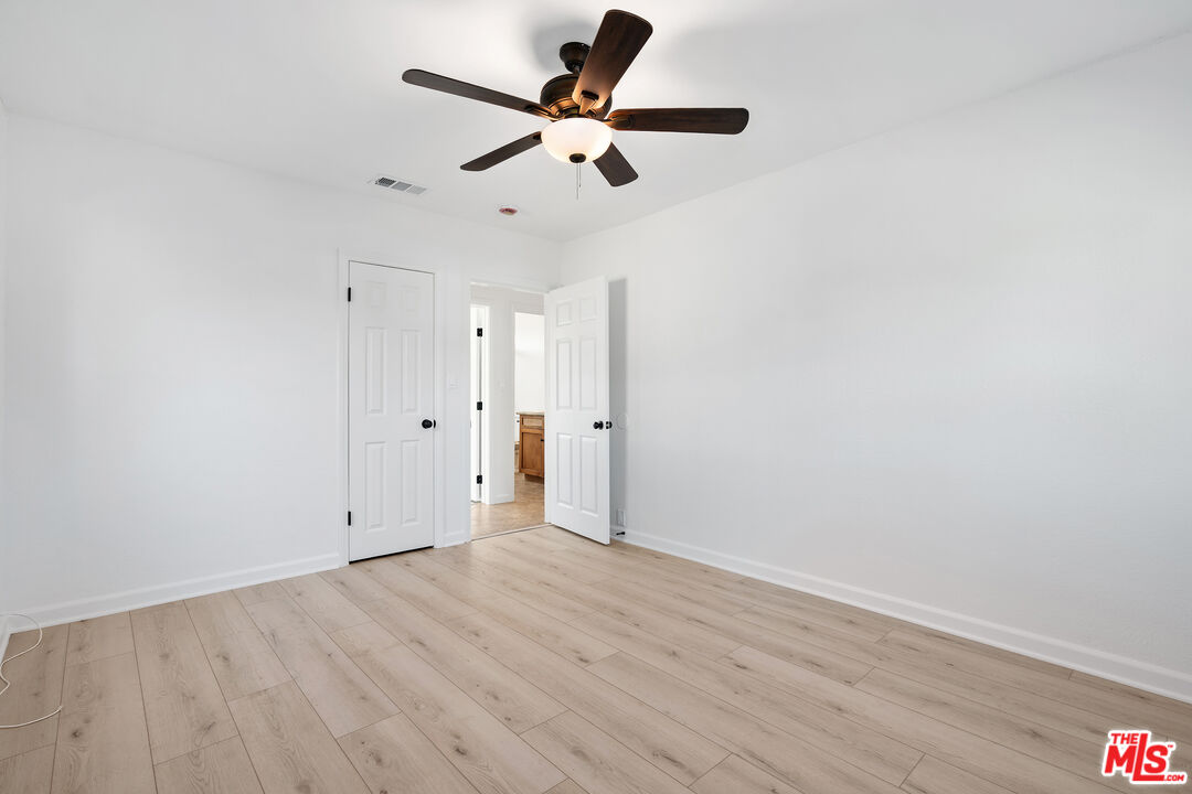 20850 Chase Street Winnetka, CA 91306 - Photo 15 of 25 wooden floor in an empty room