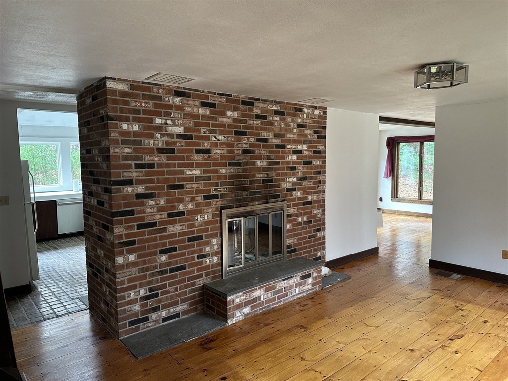 332 Old Littleton Road Harvard, MA 01451 - Photo 11 of 31 a view of an empty room and wooden floor
