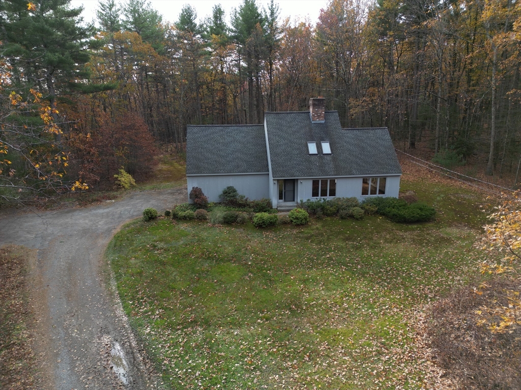 332 Old Littleton Road Harvard, MA 01451 - Photo 27 of 31 a front view of a house with a yard
