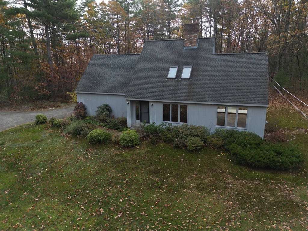 332 Old Littleton Road Harvard, MA 01451 - Photo 28 of 31 a view of a house with a yard