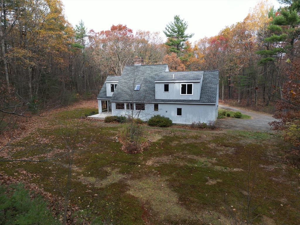 332 Old Littleton Road Harvard, MA 01451 - Photo 30 of 31 a front view of a house with a yard