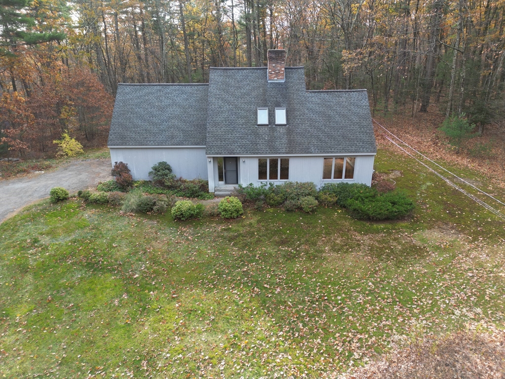 332 Old Littleton Road Harvard, MA 01451 - Photo 31 of 31 a aerial view of a house with a yard