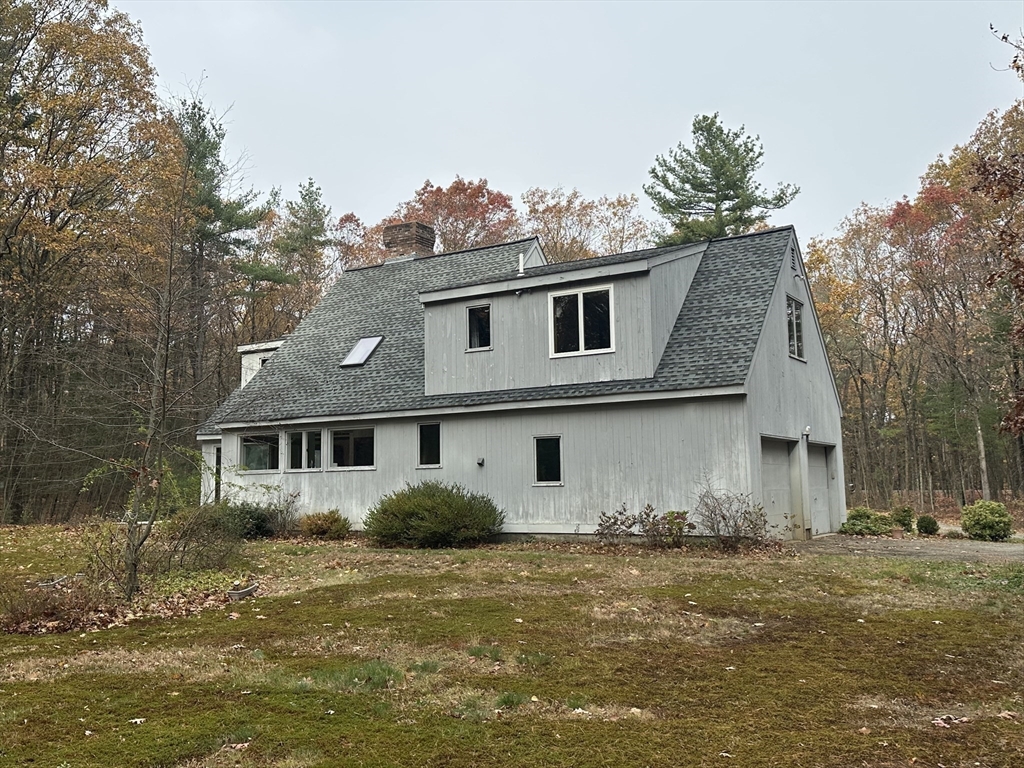 332 Old Littleton Road Harvard, MA 01451 - Photo 5 of 31 a view of a yard with a house