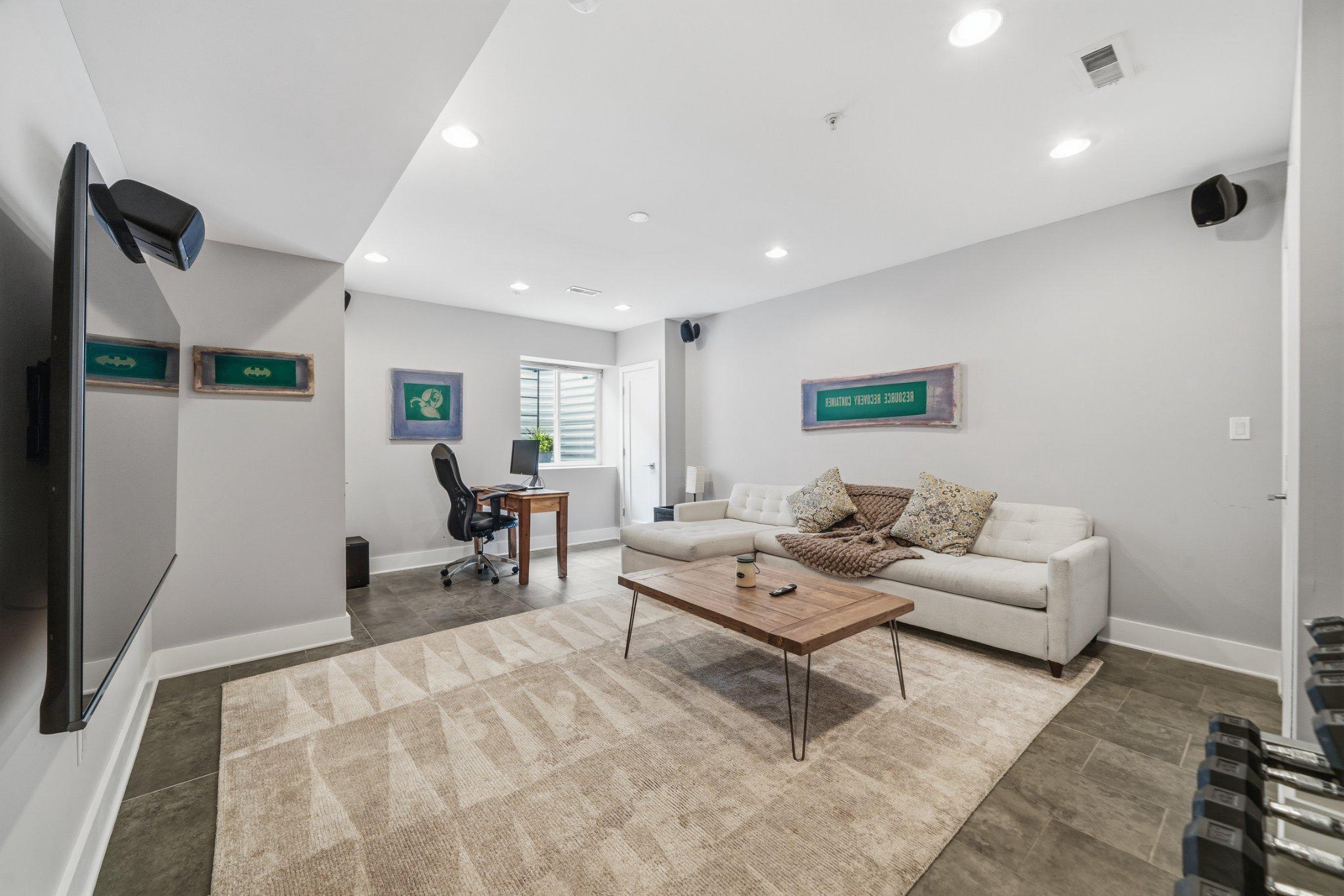 237 West Thompson Street Philadelphia, PA 19122 - Photo 30 of 35 Fully finished basement with natural light.