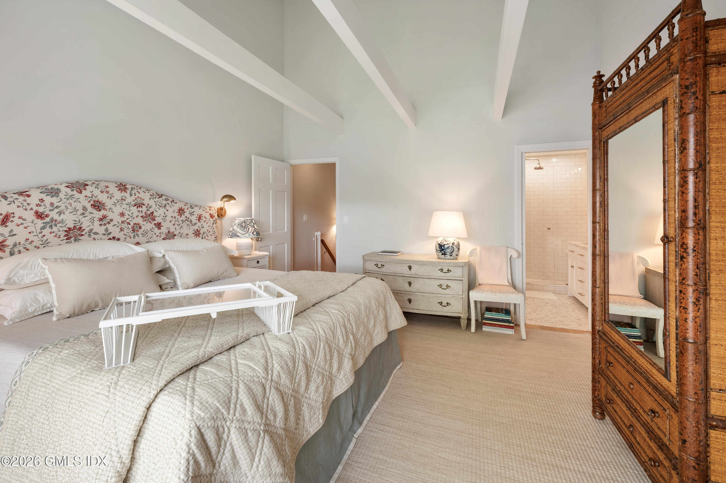 115 River Road, Unit 3 Cos Cob, CT 06807 - Photo 29 of 40 a bed room with a bed and a chair