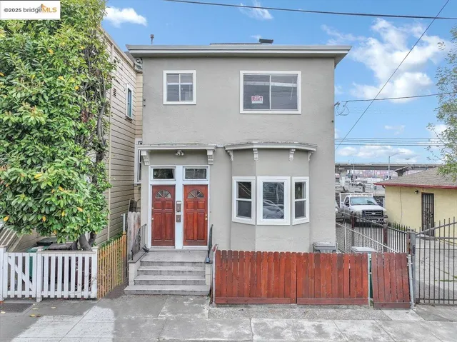 a front view of a house with a garage