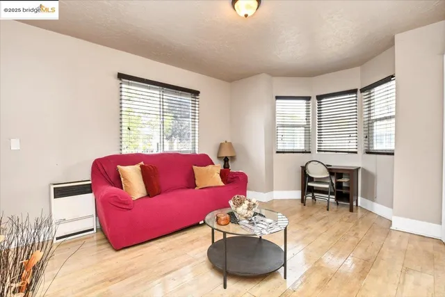 a living room with furniture and a table