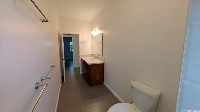 a bathroom with a sink and toilet