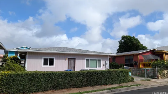 a front view of house with a yard