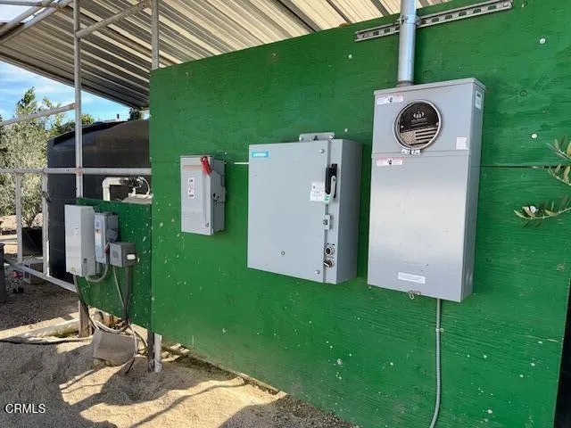 a view of a street with an outdoor seating