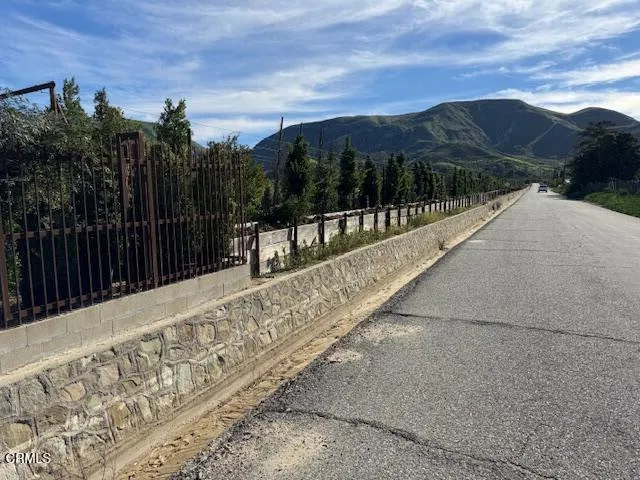 a view of a city with an ocean view