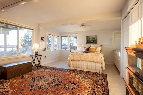 a view of a house with a yard and garage