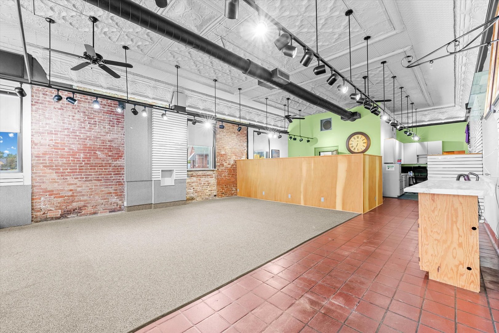 101 East Sangamon Avenue Rantoul, IL 61866 - Photo 3 of 26 a view of a room with refrigerator and windows