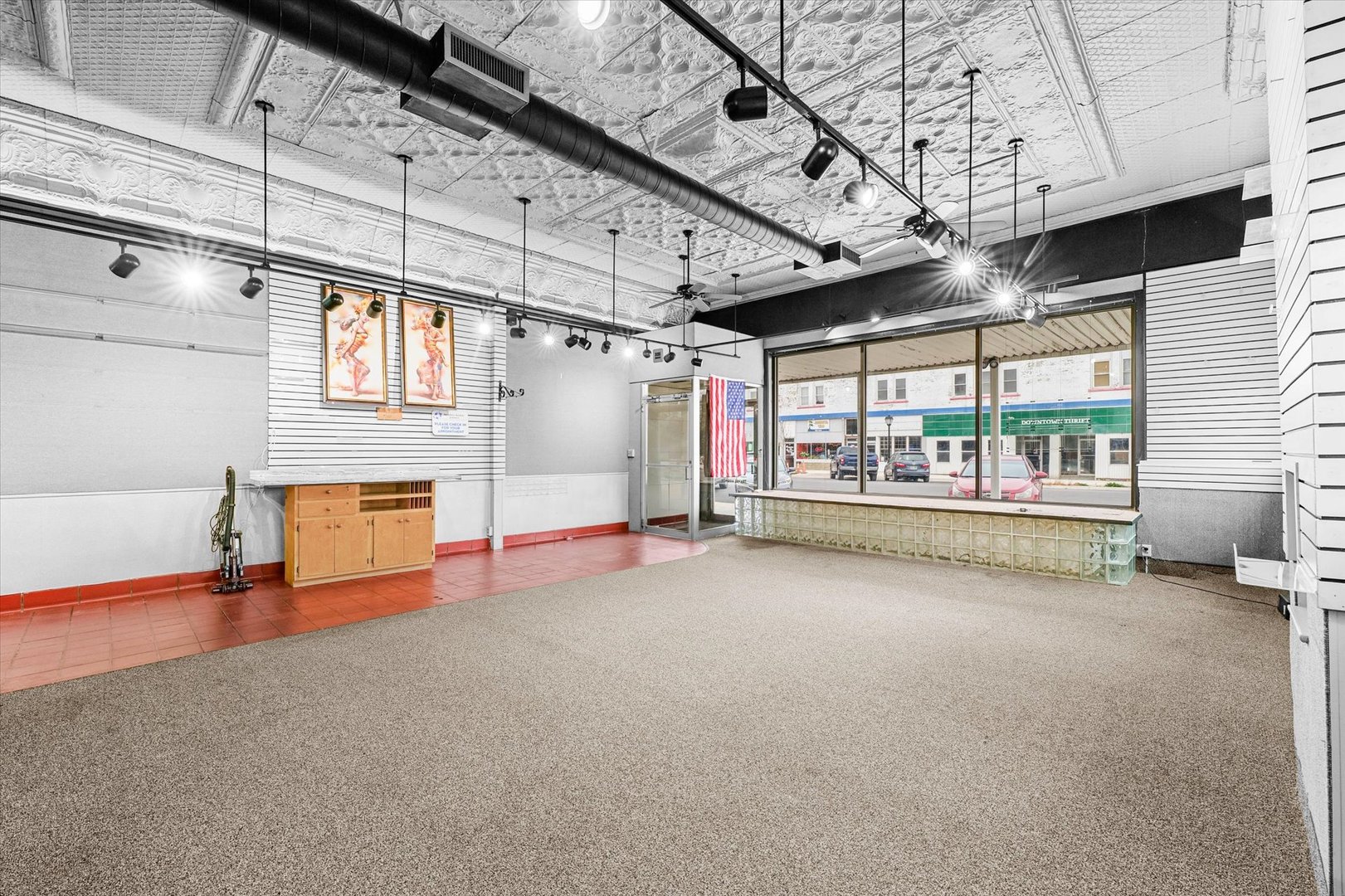 101 East Sangamon Avenue Rantoul, IL 61866 - Photo 5 of 26 a view of an empty room with a window