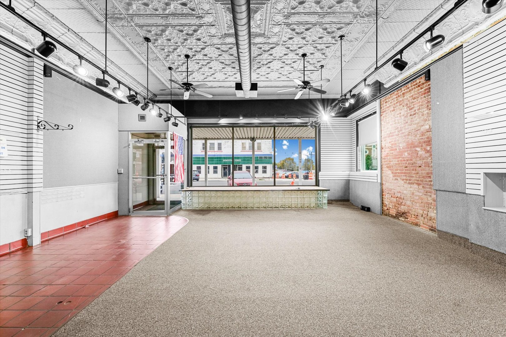 101 East Sangamon Avenue Rantoul, IL 61866 - Photo 6 of 26 a view of an empty room with a window