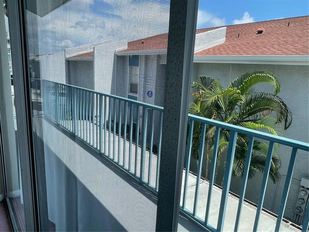 273 Rex Place, Unit G Madeira Beach, FL 33708 - Photo 38 of 42 a view of a balcony