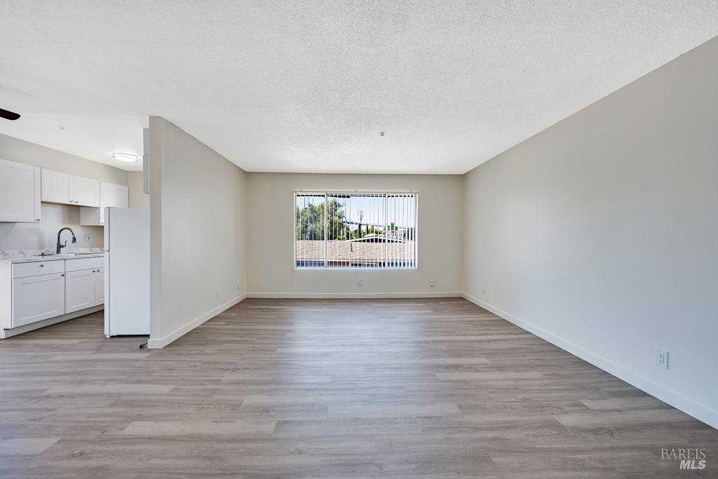 1155-1175 Evans Drive Santa Rosa, CA 95405 - Photo 21 of 31 a view of an empty room and window