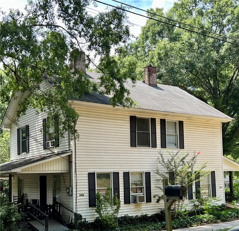 3304 Maple Road Southeast Lindale, GA 30147 - Photo 1 of 1 a front view of a house with garden