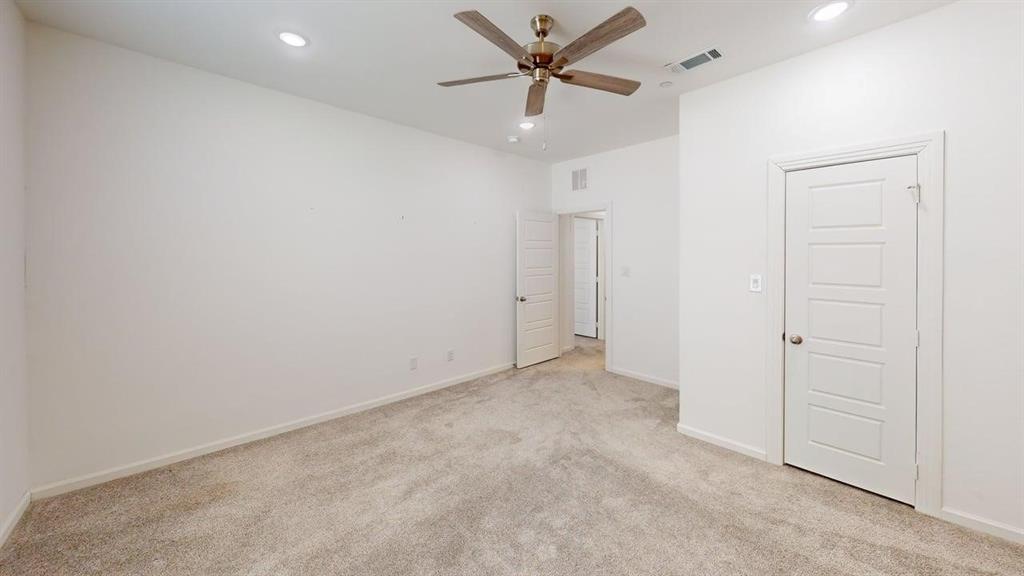 346 Buck Ridge Drive Frisco, TX 75068 - Photo 11 of 19 Unfurnished bedroom with recessed lighting, light carpet, and ceiling fan