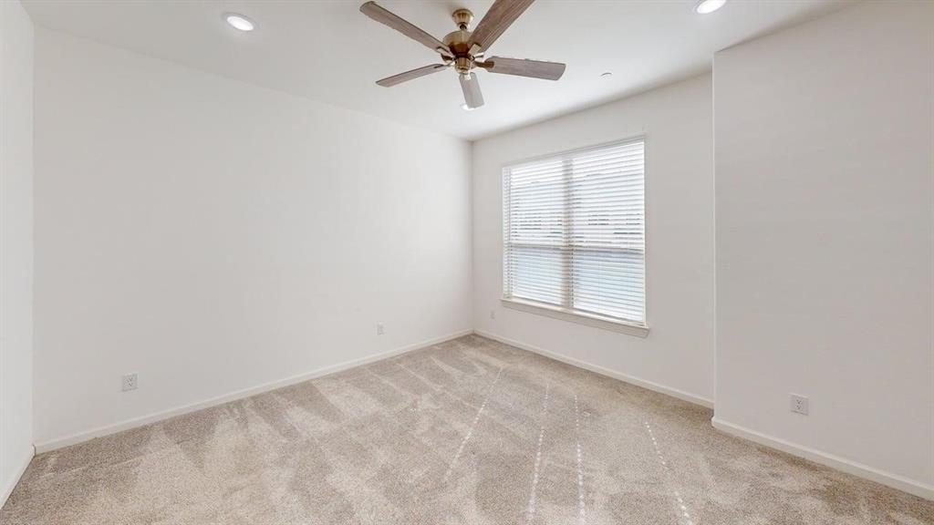 346 Buck Ridge Drive Frisco, TX 75068 - Photo 12 of 19 Spare room featuring light carpet, recessed lighting, and a ceiling fan
