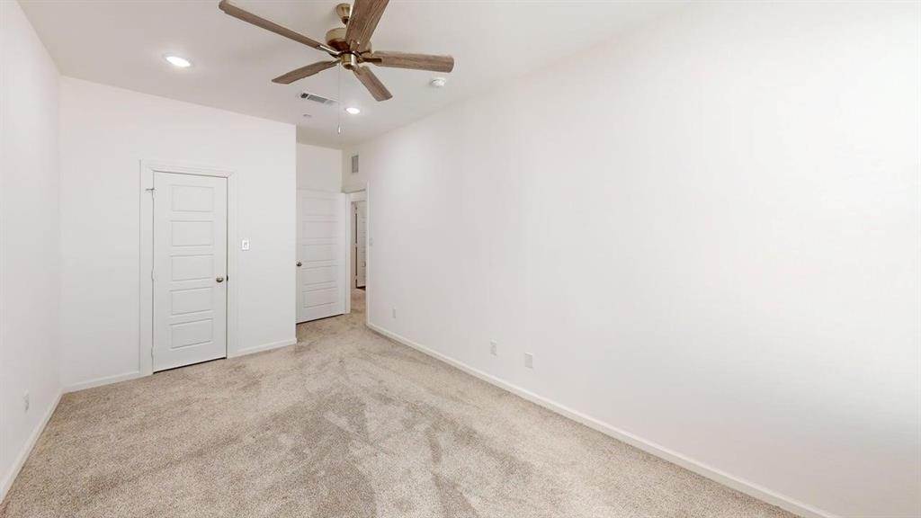 346 Buck Ridge Drive Frisco, TX 75068 - Photo 14 of 19 Unfurnished bedroom featuring light carpet, recessed lighting, a ceiling fan, and a closet