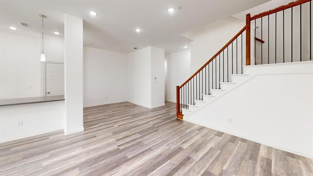 346 Buck Ridge Drive Frisco, TX 75068 - Photo 6 of 19 Below grade area with light wood-style floors and recessed lighting