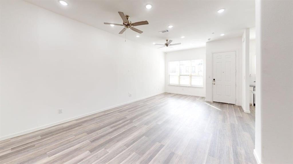 346 Buck Ridge Drive Frisco, TX 75068 - Photo 7 of 19 Spare room featuring light wood-type flooring, recessed lighting, and ceiling fan