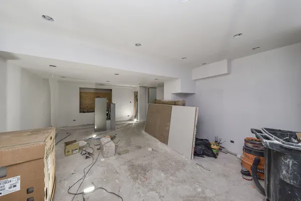 a room with gym equipment and air hockey table