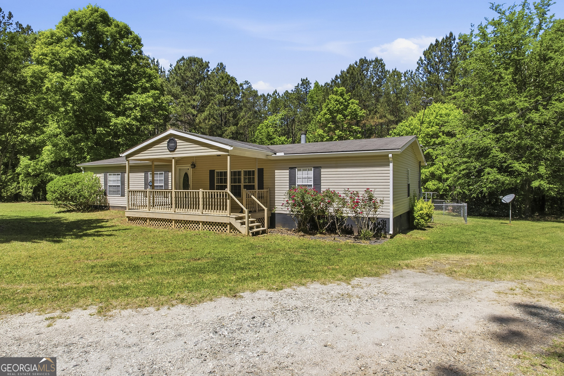 398 Jeffrey Way Forsyth, GA 31029 - Photo 1 of 1 a view of a house with a yard balcony and sitting area