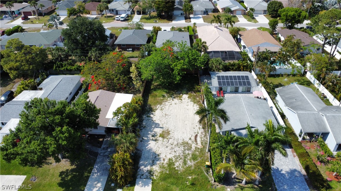 an aerial view of house with yard