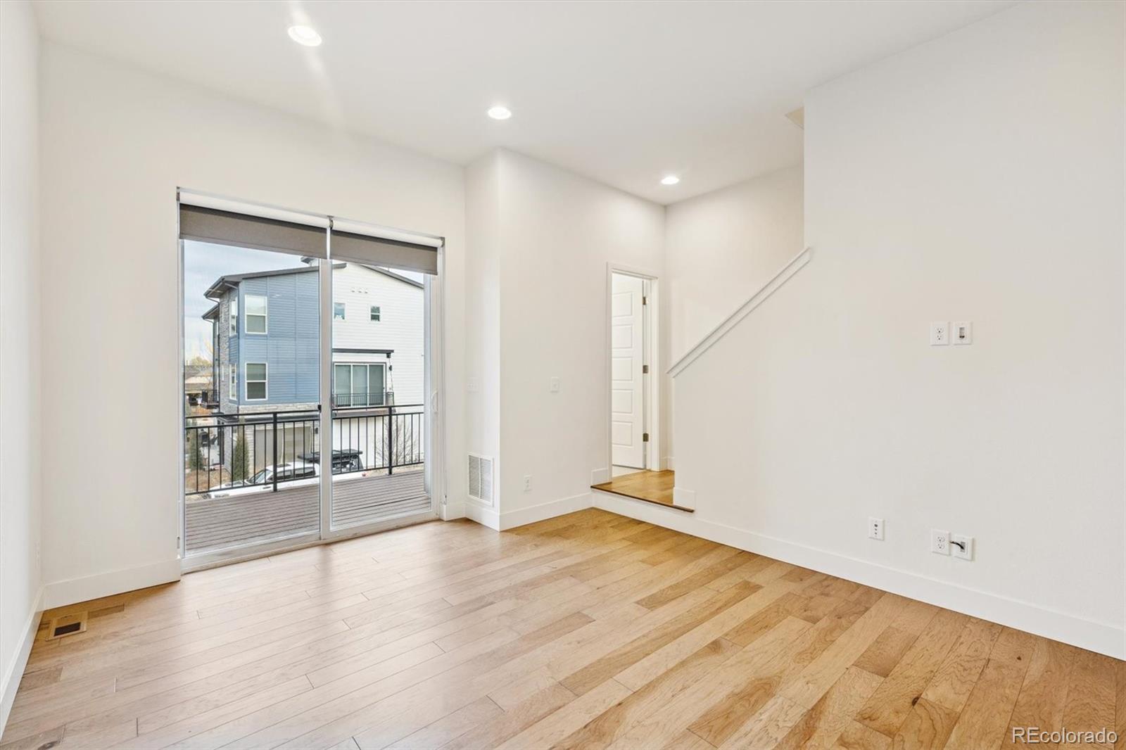 7812 West 43rd Place Wheat Ridge, CO 80033 - Photo 8 of 23 a view of an empty room