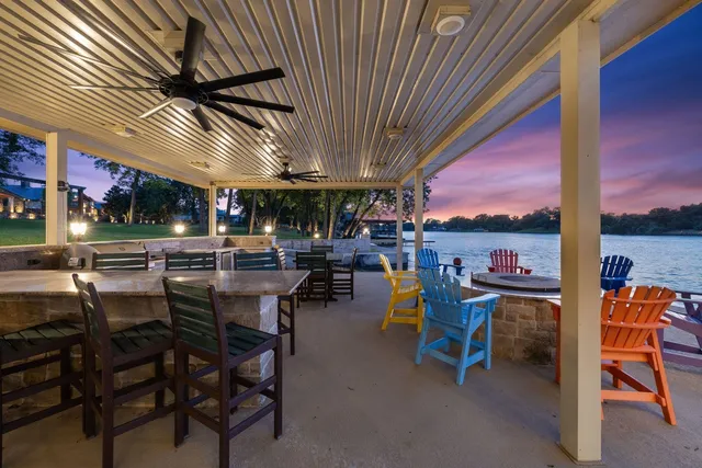 an aerial view of a house with outdoor space