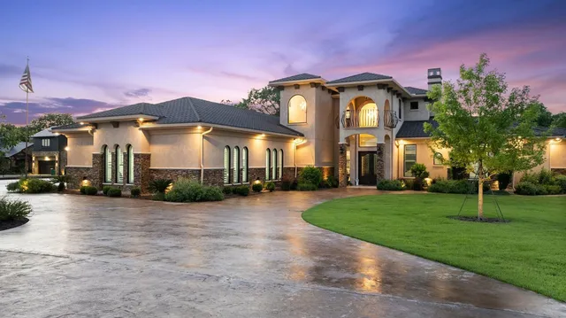 a view of a city with mountains in the background