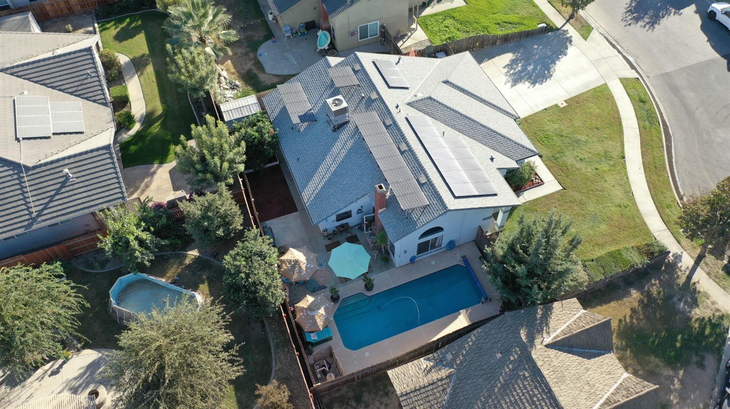 1570 Pine Drive Lemoore, CA 93245 - Photo 23 of 24 an aerial view of a house having yard