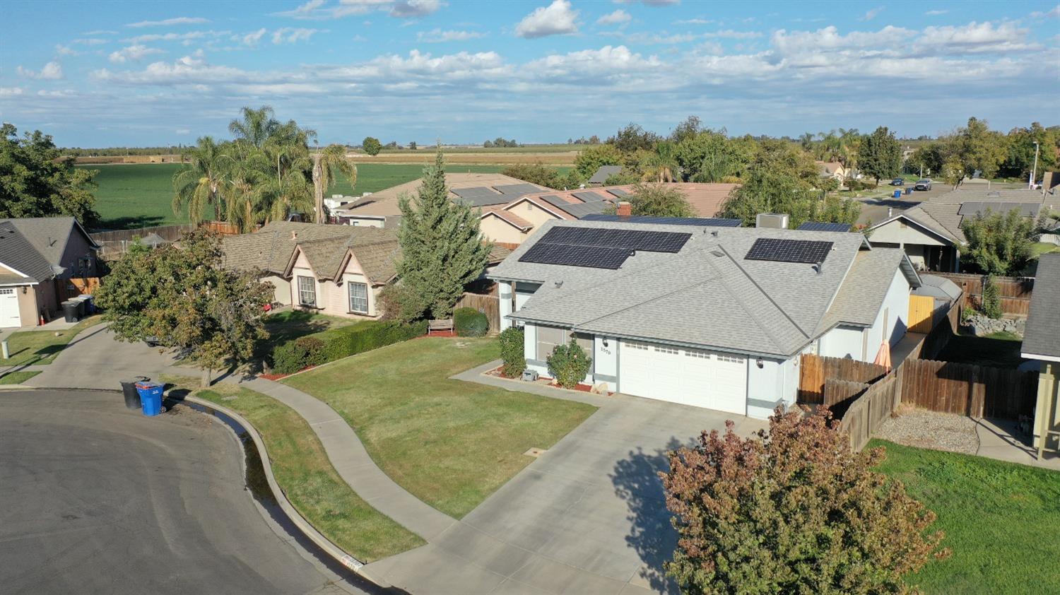 1570 Pine Drive Lemoore, CA 93245 - Photo 3 of 24 an aerial view of a house with a yard basket ball court and outdoor seating