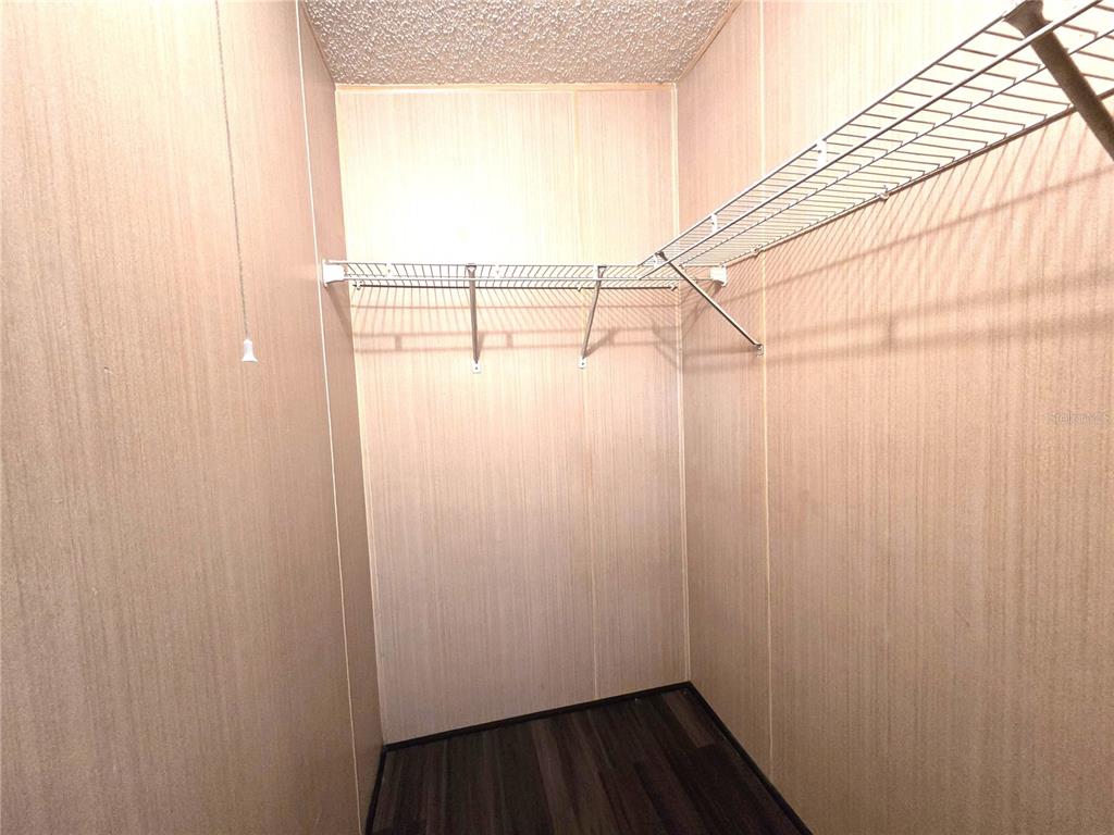 14822 Dilbeck Drive Spring Hill, FL 34610 - Photo 11 of 40 a view of small space with wooden floor