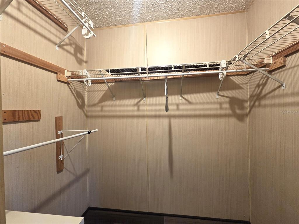 14822 Dilbeck Drive Spring Hill, FL 34610 - Photo 15 of 40 a view of a room with racks on the wall