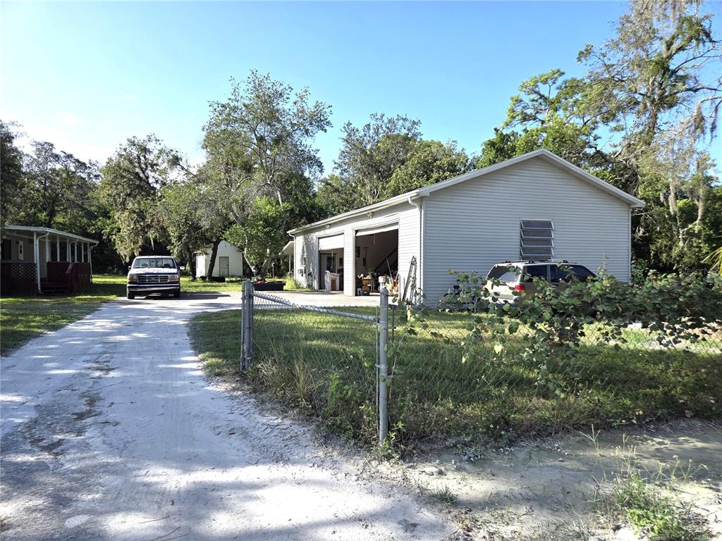 14822 Dilbeck Drive Spring Hill, FL 34610 - Photo 36 of 40 a view of a yard in front of house