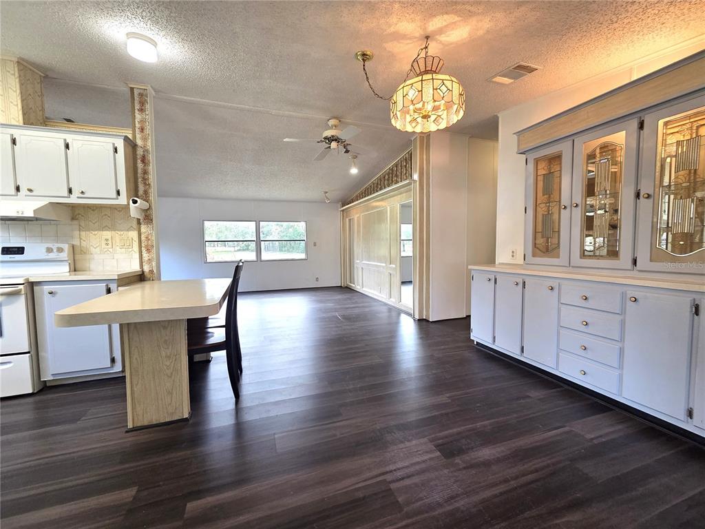 14822 Dilbeck Drive Spring Hill, FL 34610 - Photo 4 of 40 a view of a kitchen with breakfast area