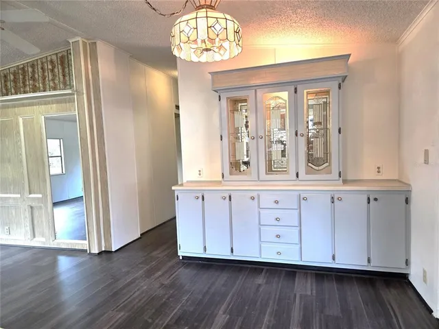 an entryway with wooden floors
