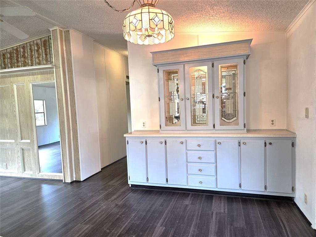 14822 Dilbeck Drive Spring Hill, FL 34610 - Photo 5 of 40 an entryway with wooden floors