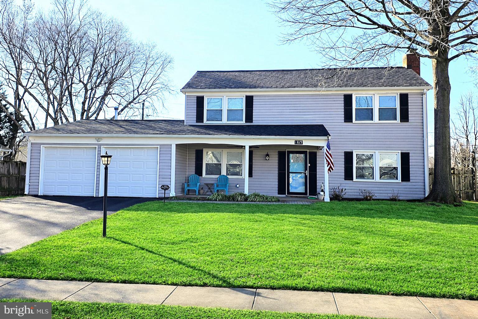 a view of a brick house with a yard