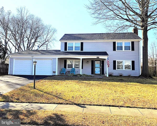 a front view of a house with swimming pool
