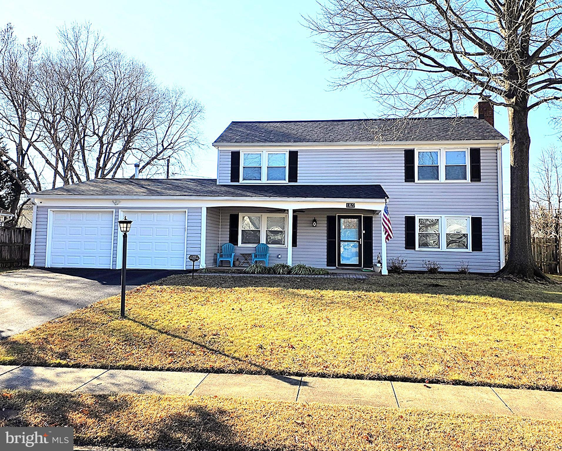 a front view of a house with swimming pool