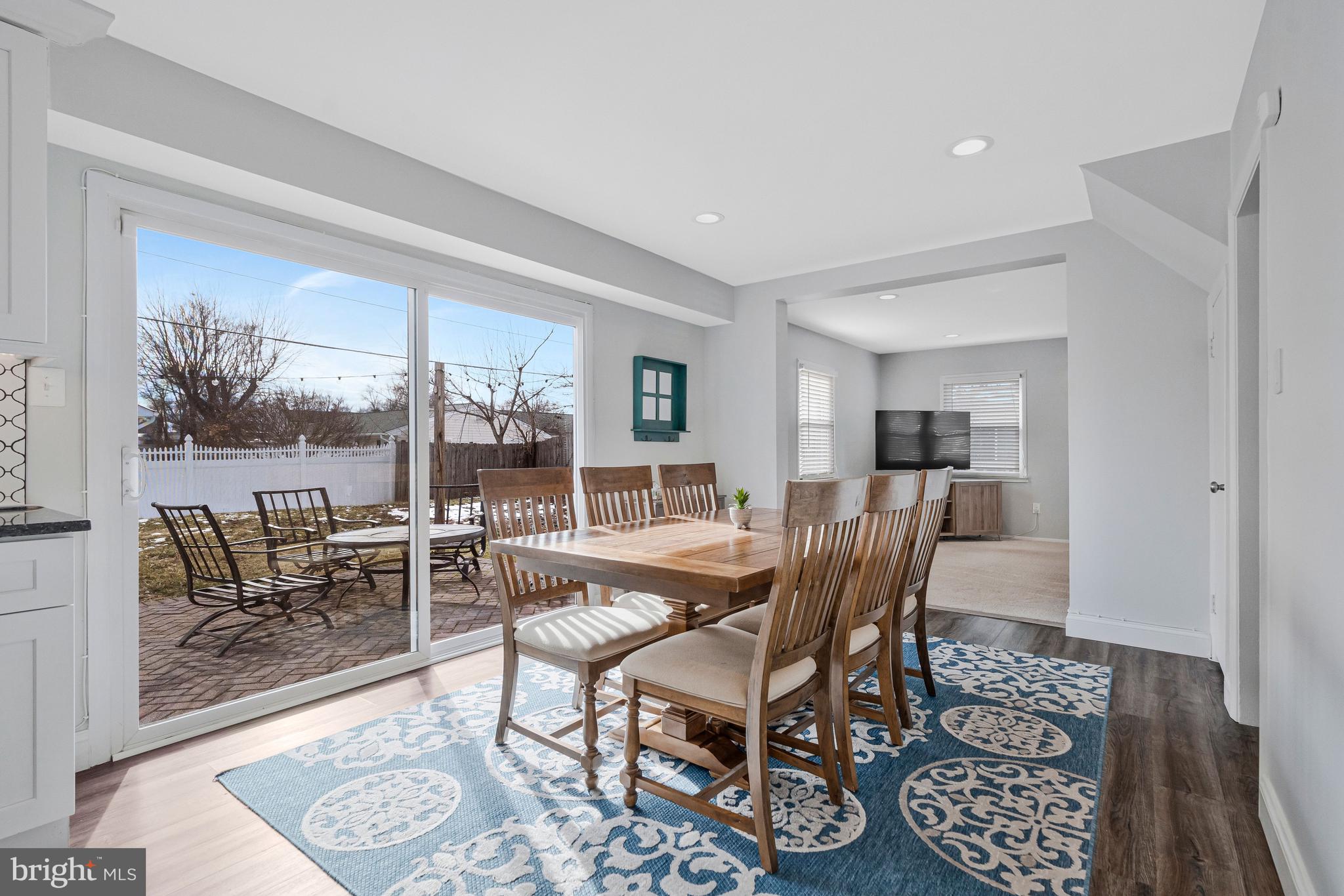 13127 Parson Lane Fairfax, VA 22033 - Photo 14 of 44 a dining room with furniture and wooden floor