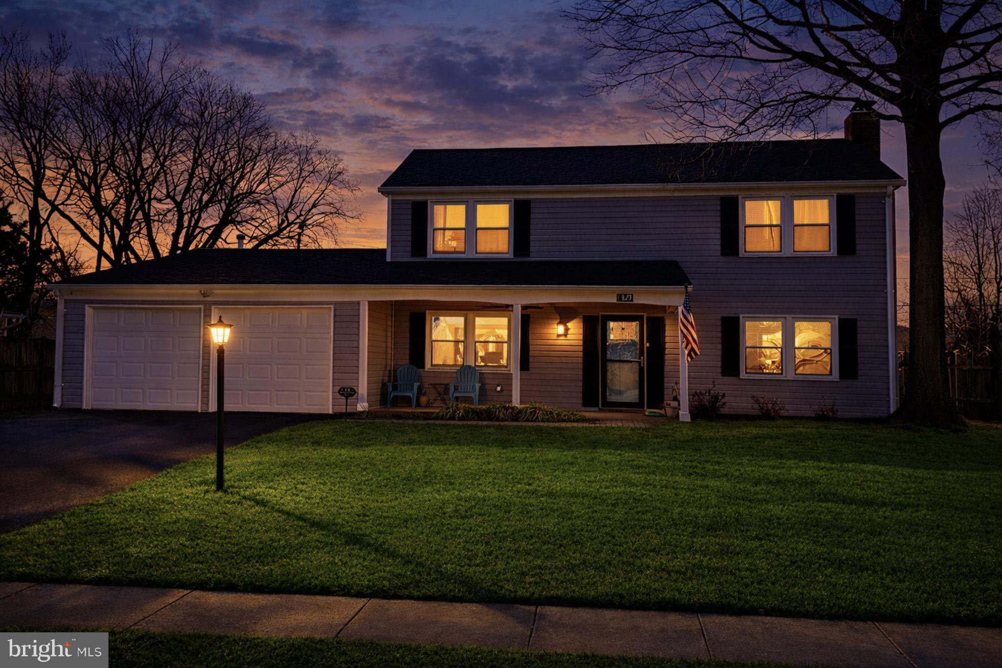 13127 Parson Lane Fairfax, VA 22033 - Photo 2 of 44 a front view of a house with a yard