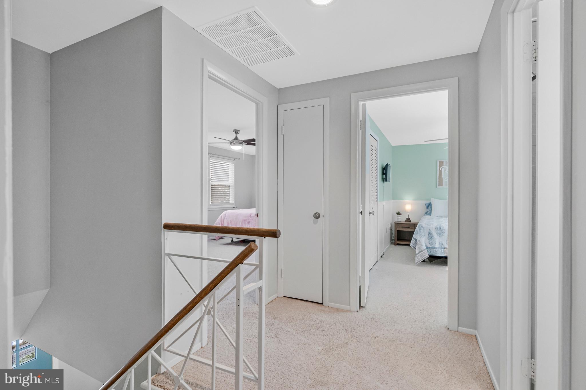 13127 Parson Lane Fairfax, VA 22033 - Photo 23 of 44 a view of a hallway with a livingroom and a bathroom